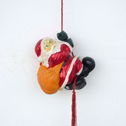 santa claus escalando