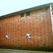 Mensch und Tier/Mens en Dier,2004 Ansicht Fototafel in Millingen aan de Rijn/NL Parkplatz Supermarkt C 1000