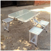 Mesa y asientos plegable camping Plateada / Arriendo: $18.000 / Garantía: $50.000