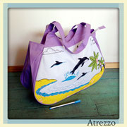 Bolso playa Delfines Lila / REF: VAR- 040 / 1 unidad/ Arriendo: $ 3.000 / Garantía: $ 10.000