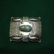 Geradine Yazzie [ Navajo ]  Stamp work; stone set; repousse; concho belt.    # 8 Turquoise [Nevada ]  Buckle