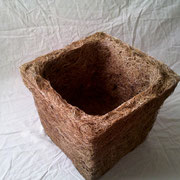 Maceta en fibra de coco.