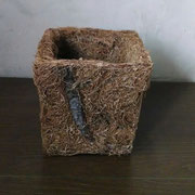 Maceta en fibra de coco.