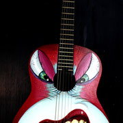 "Hungry", handpainted on classic guitar 