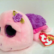 Rosie: "I am pink and purple and swim happily, my shell's covered with roses for you to see!