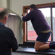 2020 06 20  Working Bee. Brian Reid supervising Col Crittenden fitting the kitchen blinds. 