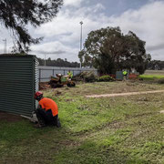 2021 07 29 Young Mate cranking up his chainsaw. I hope he's not going to use it on that steel shed.