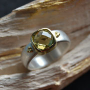 Silberring mit Lemoncitrin in Gelbgoldfassung