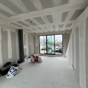 Placage sur l'isolant intérieur