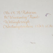 gold copperplate on wedding invitation envelope