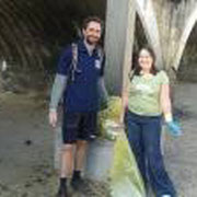 IOI SA Director Adnan Awad and IOI SA assistant Shannon Hampton engaged in clean-up activities at Kalk Bay, South Africa