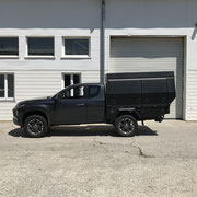 Mitsubishi L200 Pickup mit Ladefläche und Wohnbox als Flatbed-Camper für Geländeeinsätze