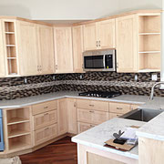 Clear finished maple kitchen with shaker style doors.  Sink and cabinet pulls provided by Kegg's Kreations.
