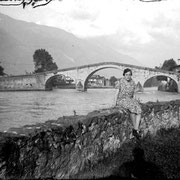 1929. Lina grandmother near the Ganda bridge in Morbegno (SO).