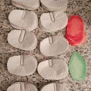 Flower petals are cut out of paper.