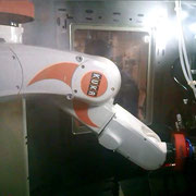 Robot de service d'un tour automatique