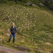 At Ormaig rockart site with Ormaig Landart Project in the background. Photography: Aaron Watson