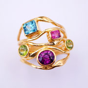 5er-Ring in feingoldplattiertem Silber mit einem blauen Zirkon, einem Spinell, einem Rodolith und zwei Peridots
