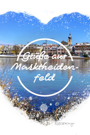 Postkarte: Marktheidenfeld im Winter | Mainkai mit Laurentiuskirche  in der Mitte steht der Text - Grüße aus Marktheidenfeld