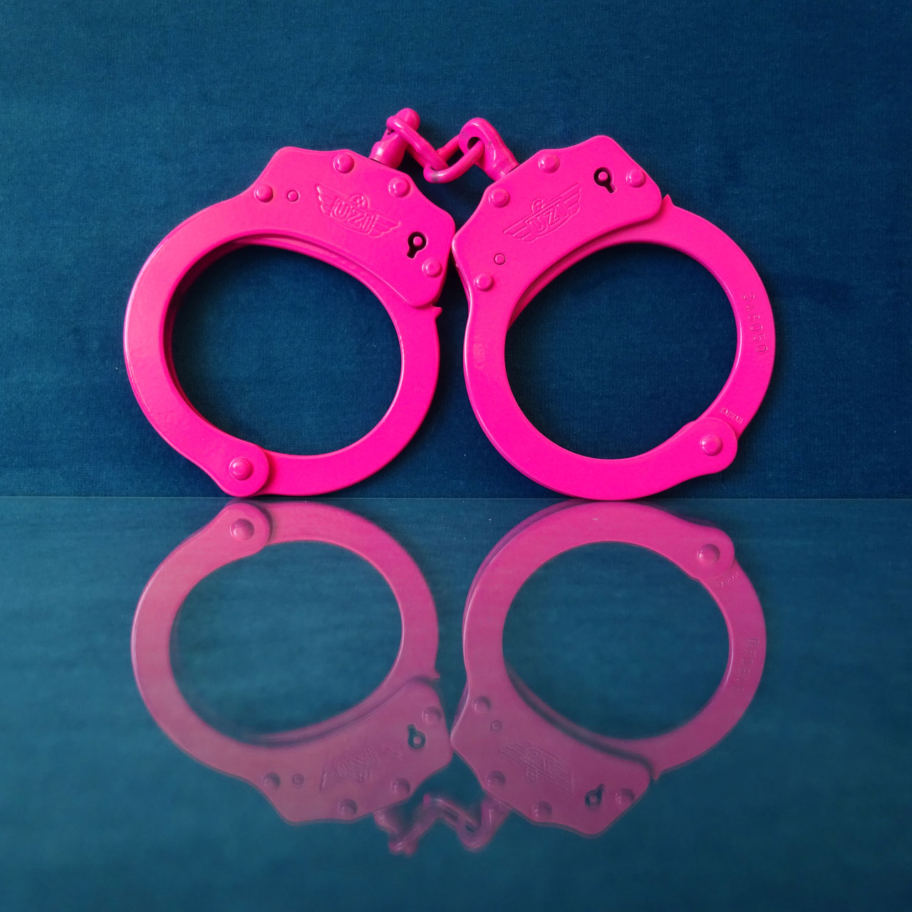 Uzi Pink Steel Handcuffs