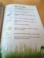 Page from book "Lieldienas" with meanings of symbols on Latvian painted Easter eggs