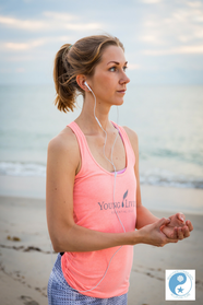 Massaging acupuncture points at beach