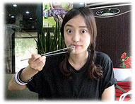 Picture of young Korean woman at a restaurant - Bild einer jungen Koreanerin im Restaurant