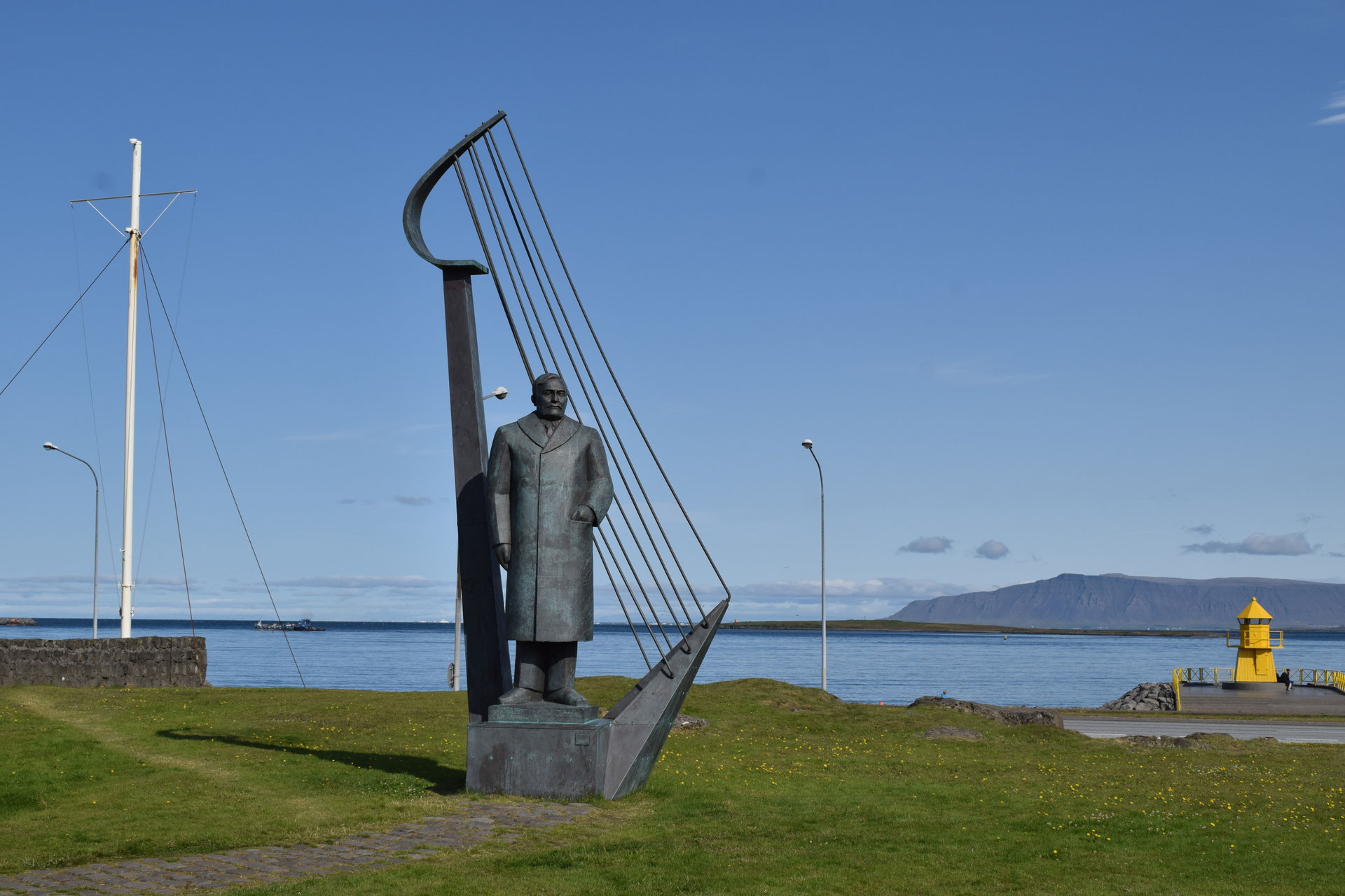 Reykjavik with sculptures and tourists in the sunshine. Feathery Travels