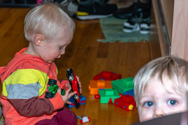 Owen with his red car.