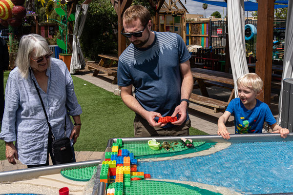 Owen with Grandma and Dad - water table -San Diego Children's Discovery Museum