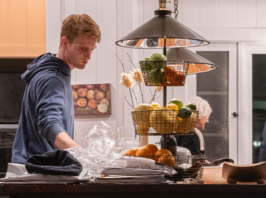 David's 90th birthday party - Matt cleaning up