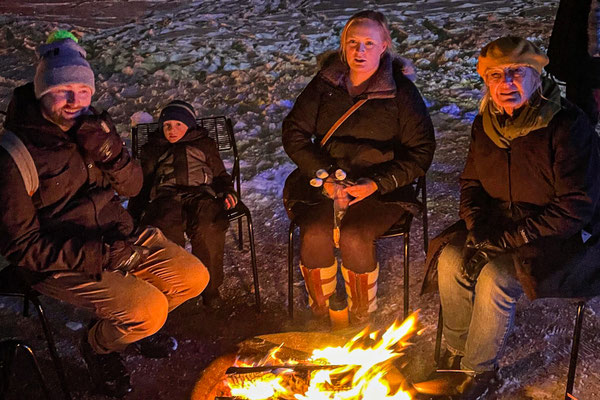 Chris, Owen, Zoe and Grandma Kathy making s'mores at the Minnesota Arboretum Light Show