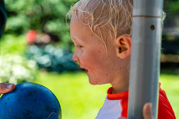 Summer shot of Owen after jumping on Martha's trampoline