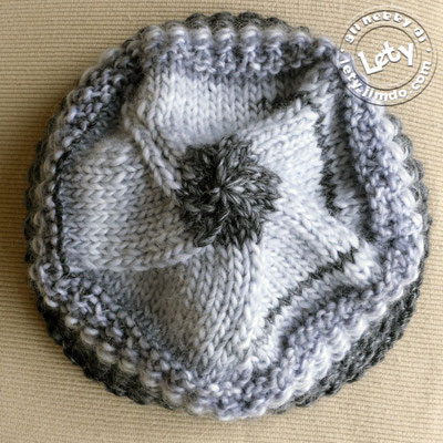 basco ai ferri: http://knittiland.blogspot.com/2010/03/cappellino-paris.html