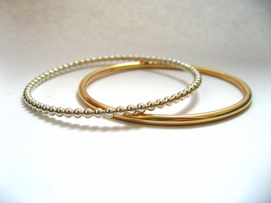 Armreif aus Gold und Silber