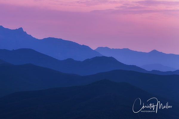 Cascade of Mountain Ridges during dusk in Corsica "Desert des Agriates"