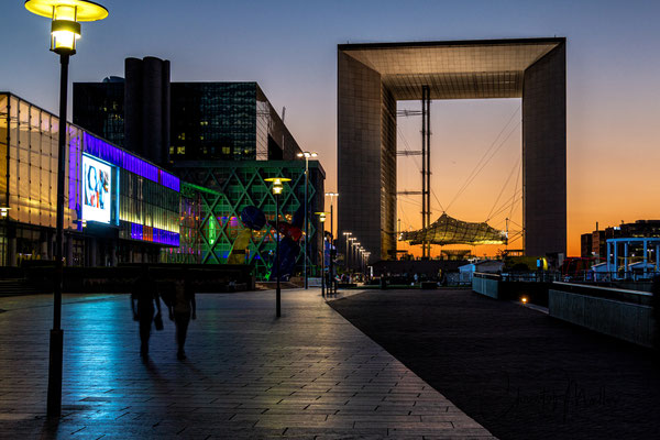 The "Grand Arche" at "La Défense" and the esplanade "Le Parvis" in Paris an urban area in steel and glass.  