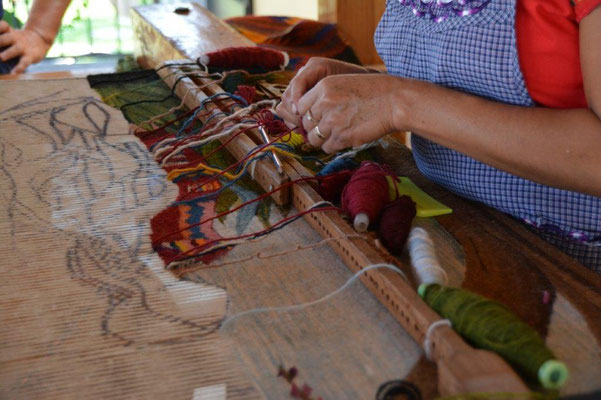 New carpet in production on the weaving loom