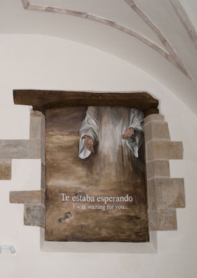 Mural que significa la acogida al peregrino.