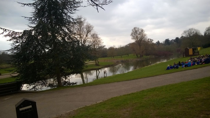 The area on the far side of the water is where the burning misile landed; on the right side you can see the stage for the Wicked Warwick Show.