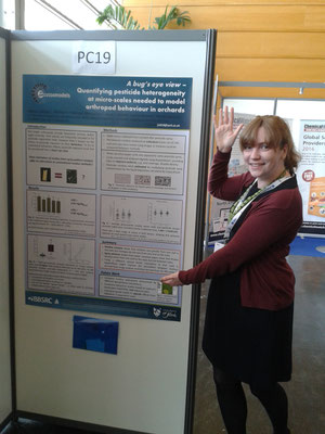 Jo proudly presenting her poster.