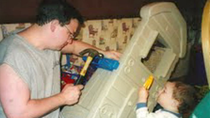 Papa Jonas and his little handyman.