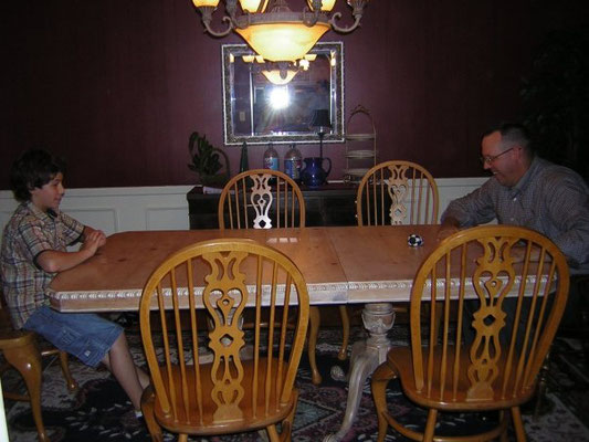Nick playing a game with Mandy's father.