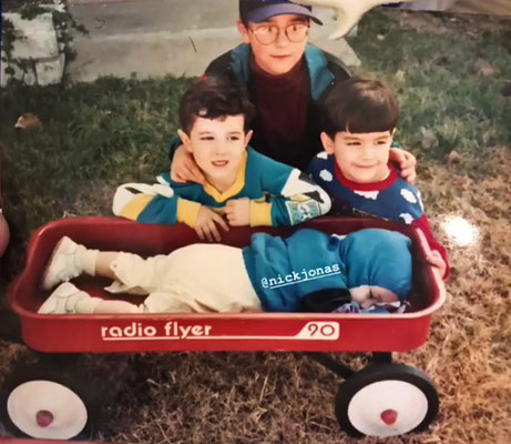 The duo becomes a trio - Nicholas, Joseph, Kevin and uncle Josh. Shared by Josh on Nick's 26th birthday!