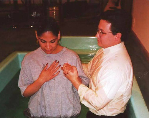 Pastor Kevin Jonas christening a girl at Wyckoff Assembly of God, 1996. 