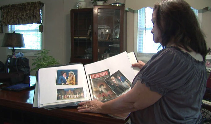 The boys' grandma showing some pictures of Joe in 'Oliver!'