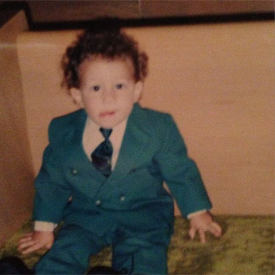 Baby Nick in a suit.