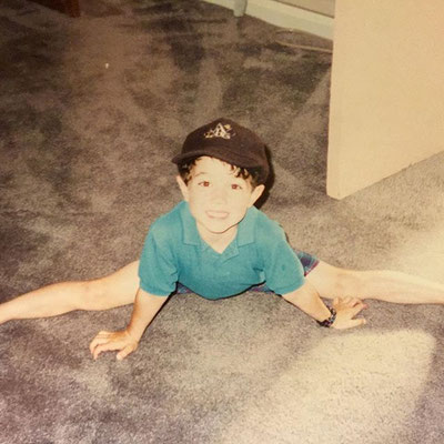 Adorable little Kevin doing a split.