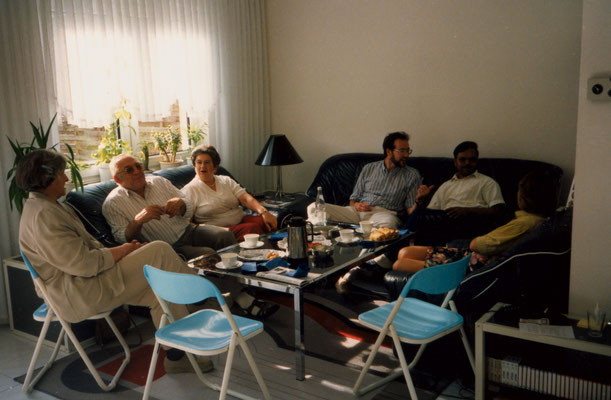 With parents, friend Ravinder and colleagues, Berlin, 1990.