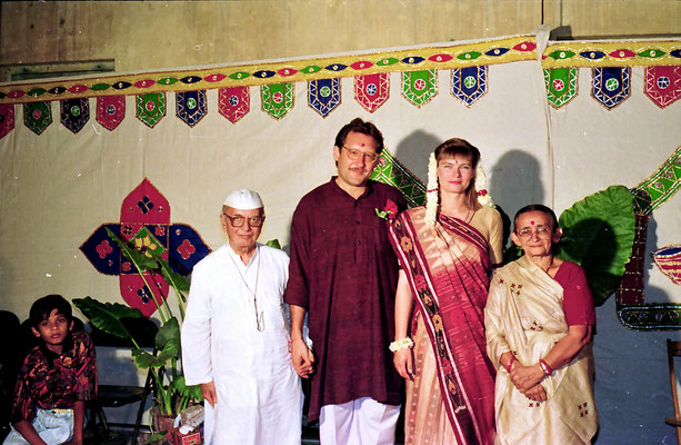 The newly wed couple posing with well-wishers during a reception at Rashtriyashala Ashram, Rajkot, Gujarat, 1994.